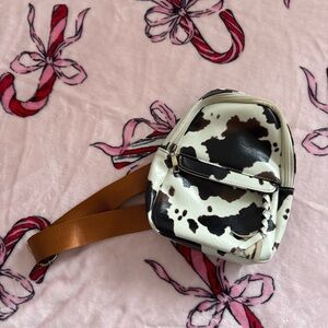 Cow print mini sling bag